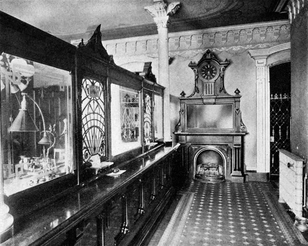 Interior of the National Bank of Commerce, showing the cashier's window.