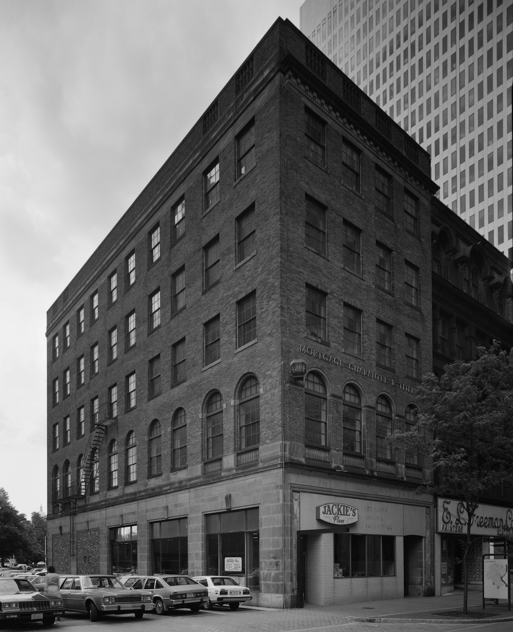 Former offices of the  Phenix National Bank at 85-89 Westminster Street, in a circa 1970s photograph (from the Library of Congress). The bank's name is visible above the first floor, on the right side of this image. 